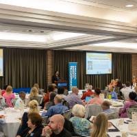 Dean Soman giving the welcome address